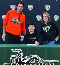 The Livingston High School Athletic Department recently held National Signing Day ceremonies for senior athletes who will be playing sports at the colleges and universities they will be attending next year. Shown here, competing in collegiate track will be Chase Kaufman, who will be on the Colgate University team. He is shown here with coaches Raz Blau and Nancy Petryna