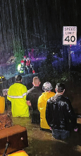 Emergency Personnel Take Part in Dramatic Water Rescue As Hurricane Ida Drops Ten Inches of Rain on Livingston